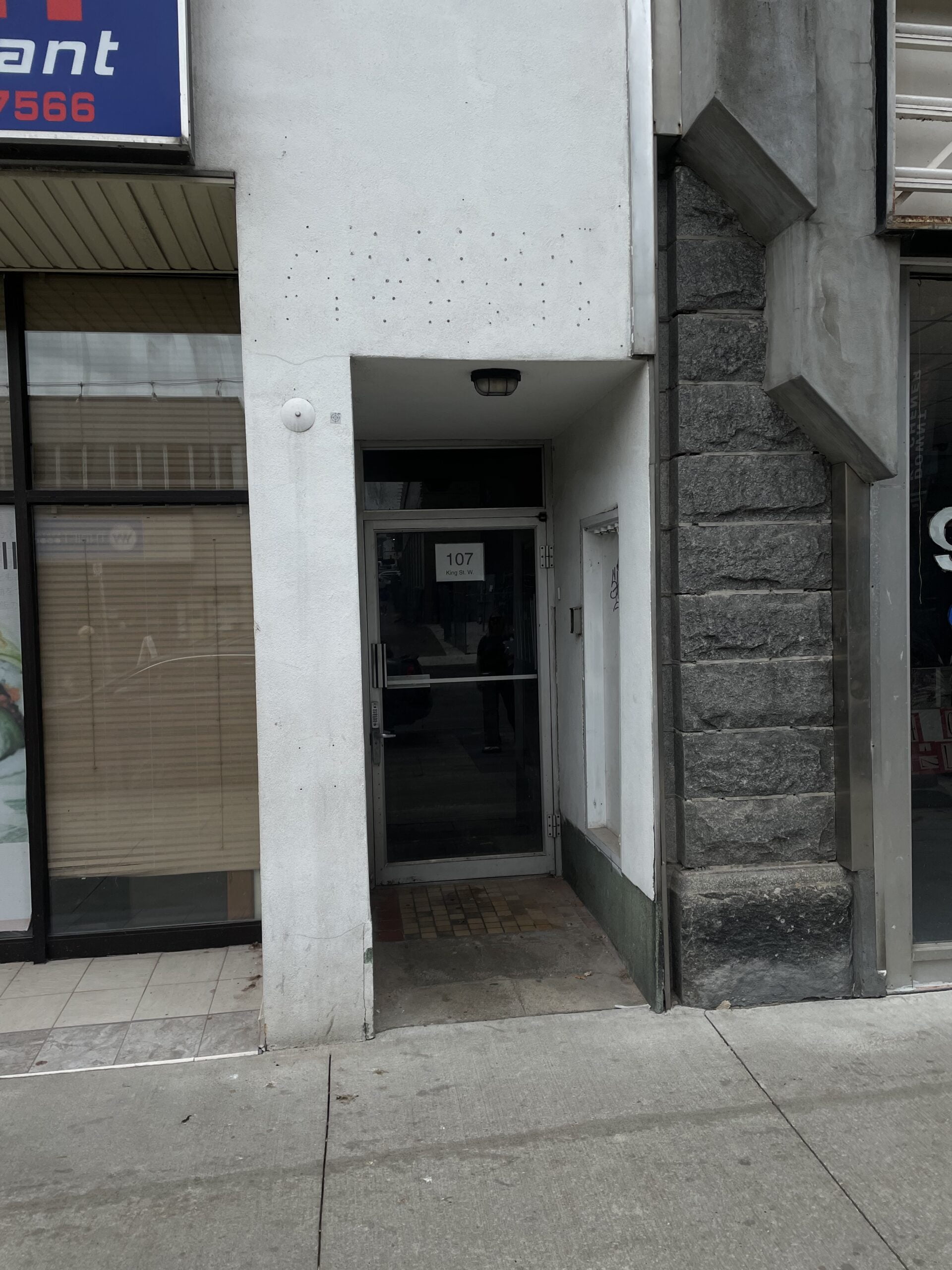 Doorway to entrance of 107 King Street W