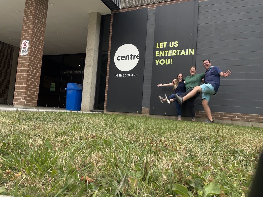 Chelsea, Joanna, and Jared celebrate the end of the DTK History Crawl by high stepping at the Centre in the Square