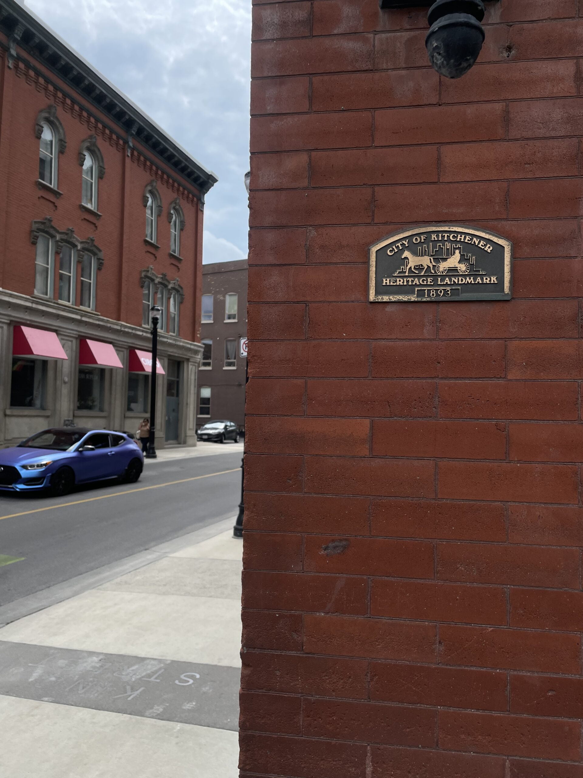 Corner of King and Queen Street in Downtown Kitchener - plaque of Heritage landmark 1893